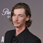 When people search for Jacob Lofland net worth, they usually want one straightforward number. The reality is more complicated because the actor has never publicly disclosed a verified personal balance sheet, and celebrity net-worth websites often publish estimates without access to private contracts, taxes, investments, expenses, or assets. As of 2026, online estimates vary substantially. Some sources place his wealth around $1 million to $2 million, while another automated estimate puts it near $3.99 million. Those figures should be treated as estimates rather than confirmed financial facts. What can be established much more confidently is how Lofland built his career. Born in Arkansas in 1996, he began acting professionally as a teenager in Mud, later appeared in the Maze Runner films, Justified, The Son, Joker: Folie à Deux, and became widely recognized as Cooper Norris in Landman. What Is Jacob Lofland Net Worth in 2026? There is no officially confirmed public figure for Jacob Lofland's net worth in 2026. The most defensible approach is therefore to present a range rather than pretend that an exact number is known. Several entertainment websites currently estimate his wealth at roughly $1 million to $2 million, while PeopleAI reports an estimated $3.99 million for July 2026 and explicitly says its figure is calculated from social factors and may differ substantially from actual income. That difference is significant. A celebrity's net worth is not the same thing as their lifetime acting income. An actor might earn substantial gross compensation while owing taxes, agent commissions, manager fees, legal expenses, production-related costs, and other deductions. There can also be money tied up in property or investments that does not appear as readily available cash. For that reason, a reasonable summary is: Estimated 2026 range: approximately $1 million–$4 million, with the lower $1 million–$2 million range appearing in multiple entertainment estimates, but no figure independently verified by Lofland or his representatives. That is a more honest answer than presenting one speculative number as fact. Why Is Jacob Lofland Net Worth Difficult to Verify? Celebrity wealth is surprisingly difficult to calculate from the outside. Public databases can tell us what movies and television shows an actor worked on. They generally cannot tell us exactly how much that actor received, what percentage went to representatives, how much was withheld for taxes, or how much was subsequently invested. For Lofland, the problem becomes even clearer when looking at his career timeline. His first credited film role came when he was still a teenager. IMDb's biography says he auditioned for Jeff Nichols' Mud after seeing a local casting notice and was offered the role within 24 hours of his audition. Since then, he has accumulated credits across films and television, including: Mud Little Accidents Justified Texas Rising Maze Runner: The Scorch Trials Free State of Jones Go North The Maze Runner: The Death Cure The Son 12 Mighty Orphans A House on the Bayou Joker: Folie à Deux Landman But knowing the number of projects does not reveal the exact amount earned from each one. That is why Jacob Lofland net worth should always be presented as an estimate unless a primary financial source becomes available. How Did Jacob Lofland Start His Acting Career? Lofland's career began in an unusual way compared with many Hollywood actors. He was born July 30, 1996, in Briggsville, Arkansas, and IMDb identifies his parents as Debra and Billy Lofland. His first major screen opportunity came through Mud, directed by Jeff Nichols. Lofland played Neckbone, a young Arkansas boy who becomes involved in the story surrounding the mysterious fugitive Mud. The role was important for more than simply giving him a film credit. Mud became a well-regarded independent film, and Rotten Tomatoes currently lists it among Lofland's highest-rated projects, with a 97% critics score. The production also gave a young Lofland an early opportunity to work alongside established performers, including Matthew McConaughey and Tye Sheridan. That kind of early experience can be valuable for an emerging actor. It provides not only exposure but also credibility for future casting opportunities. In other words, the beginning of Lofland's career helps explain why later Jacob Lofland net worth estimates should be viewed in the context of more than a single breakout role. Which Movies and TV Shows Built Jacob Lofland's Career? Lofland's financial trajectory is closely connected to the consistency of his acting career. After Mud, he appeared in Little Accidents and then took on television work, including Justified. He subsequently joined the Maze Runner franchise as Aris Jones. The Maze Runner films were especially significant because they exposed Lofland to a large international audience. His credits include: Mud Lofland's first major screen role was Neckbone. The film remains one of the most critically successful titles in his filmography. Little Accidents He played Owen Briggs in the independent drama, continuing to build experience outside a single genre. Justified Lofland appeared as Kendal Crowe during the fifth season of the acclaimed FX crime drama. TV Guide lists the role among his early television credits. Maze Runner: The Scorch Trials His role as Aris Jones placed him inside a major young-adult film franchise. Maze Runner: The Death Cure He returned as Aris for the franchise's third film. The Son Lofland played young Eli McCullough in the television series and accumulated 20 credited episodes according to IMDb. Joker: Folie à Deux He later appeared as Ricky Meline in the 2024 film. Landman This became one of the most important recent steps in his career. Lofland plays Cooper Norris, the son of Billy Bob Thornton's Tommy Norris, in Taylor Sheridan's oil-industry drama. How Much Does Jacob Lofland Make From Landman? This is the most interesting recent development when discussing Jacob Lofland net worth. In July 2026, reports citing Deadline's reporting said Lofland and Michelle Randolph had negotiated substantial salary increases ahead of Landman Season 3. Their reported compensation was $130,000 to $180,000 per episode, representing roughly a doubling of their previous salaries. That does not mean Lofland's annual income automatically equals the per-episode number multiplied by every episode produced. Television contracts can include different structures, guaranteed episodes, production schedules, options, bonuses, and other provisions. Taxes and representation costs also reduce the amount an actor ultimately keeps. Still, the reported range provides an important data point. If Lofland continues receiving prominent television roles at this level, his future earning potential is considerably higher than it was earlier in his career. That is one reason current Jacob Lofland net worth estimates may increase substantially over time. Why Did Jacob Lofland's Landman Salary Increase? The reported salary increase appears closely connected to the success of Landman. The series became a major Paramount+ performer, and reports in 2026 highlighted exceptionally strong viewership figures for its second season. TV Insider reported that Season 2's premiere drew 9.2 million streaming views over two days, while the finale reached 14.8 million worldwide views in two days. A successful television series can change the negotiating position of its cast. When an actor's character becomes more important to the story and the program demonstrates strong audience demand, the actor may have more leverage when negotiating a new contract. That appears relevant to Lofland's position. Cooper Norris is no longer simply a supporting young character. The character has become increasingly important to the show's story, particularly through his ambitions in the oil business and complicated relationship with his father. Lofland has also discussed Cooper's development publicly. In a TV Insider interview, he described the character as goal-oriented and explained how the dangerous events around Cooper could change his strategy rather than eliminate his ambitions. What Are Jacob Lofland's Main Sources of Income? Acting is clearly the primary publicly documented source of Lofland's professional income. However, the exact breakdown is private. Potential sources can include: Television acting Film acting Residual or contractual payments Promotional appearances Entertainment-related opportunities Potential investments or other private assets The important word here is potential. There is not enough reliable public information to assign a specific dollar value to each category. His television career is particularly relevant because recurring series work can provide a more predictable income stream than occasional film appearances. A successful series can also improve an actor's negotiating leverage for future projects. That career effect may ultimately be more important than any single paycheck. How Old Is Jacob Lofland in 2026? Jacob Lofland was born on July 30, 1996, in Briggsville, Arkansas. That makes him 30 years old as of July 30, 2026. IMDb and TV Guide both list his July 30, 1996 birth date. His age is relevant to his financial story because his career started unusually early. He entered the film industry as a teenager and has now accumulated more than a decade of professional screen credits. That gives him something valuable beyond current earnings: career runway. If his profile continues to grow after Landman, he has considerable time to take on higher-value projects, more prominent roles, and potentially larger contracts. Does Jacob Lofland Own Expensive Houses or Luxury Assets? There is no sufficiently reliable public evidence establishing a detailed list of Lofland's personal property, vehicles, investments, or other luxury assets. This is another reason websites claiming an exact Jacob Lofland net worth should be approached carefully. A photograph of a celebrity in an expensive car does not prove ownership. Likewise, appearing at an upscale property does not establish that the person owns it. A responsible biography should distinguish between: Verified information: His acting credits, birth date, publicly reported television salary information, and documented career history. Estimated information: His total net worth. Unverified speculation: Specific private assets or investment holdings without credible documentation. That distinction is especially important when discussing personal finances. What Awards and Recognition Has Jacob Lofland Received? Awards and industry recognition can influence an actor's career value, even when they do not directly translate into a specific net-worth figure. TV Guide reports that Lofland won the 2012 Prix d'interprétation Masculine and the 2014 Robert Altman Award, along with additional nominations. IMDb currently lists him with two wins and three nominations. Recognition early in a career can help establish credibility. For Lofland, that recognition came alongside a growing filmography rather than replacing it. His career has therefore been built through a combination of independent cinema, recognizable franchises, television dramas, and more recent mainstream projects. How Does Jacob Lofland Net Worth Compare With Other Young Actors? Comparisons can be misleading. Actors who appear in the same film or series can have dramatically different contracts based on billing, experience, role size, negotiation history, and previous box-office or television performance. The same applies to Landman. Reports indicate that Lofland and Michelle Randolph will earn between $130,000 and $180,000 per episode in Season 3, while other cast members negotiated different compensation levels. This demonstrates why simply searching for "cast salary" does not reveal net worth. An actor's total wealth depends on the accumulation of income over time and what happens to that income afterward. Someone earning less per episode could still have greater accumulated wealth because of earlier investments, property, business interests, or a longer career. What Could Increase Jacob Lofland Net Worth in the Future? Several factors could influence Lofland's financial growth. Continued Landman Success If Landman continues performing strongly, Lofland's increased compensation could become an important part of his earnings. Larger Film Roles His previous work in major productions demonstrates that he can move between television and film. A leading or high-profile supporting role could significantly increase his market value. Career Longevity Starting young gives Lofland the possibility of building a long career rather than relying on one breakout period. Stronger Negotiating Power Actors who establish a recognizable character and consistent audience appeal can often negotiate more favorable contracts. Diversification Future producing, endorsement, business, or investment activity could also affect his wealth, although there is currently insufficient evidence to quantify those possibilities. The important point is that Jacob Lofland net worth is not a static number. It is a moving estimate influenced by income, assets, expenses, taxes, career opportunities, and financial decisions. What Is the Most Realistic Jacob Lofland Net Worth Estimate? Putting the available evidence together requires some caution. Public estimates currently span from around $1 million to $4 million. Multiple sites place him around $1 million–$2 million, while PeopleAI gives a substantially higher automated estimate of $3.99 million and explicitly warns that its calculation may differ from actual income. The newer reported Landman salary is concrete evidence of increased earning power, but it does not prove a corresponding net-worth figure. Therefore, the most responsible conclusion is: Jacob Lofland's 2026 net worth is not publicly verified; available estimates generally place him in the low-single-digit millions, with roughly $1 million–$4 million being a defensible broad range. If a website presents "$3.99 million" or "$1 million" as an exact confirmed amount, remember that neither figure has been publicly established by Lofland himself. Frequently Asked Questions About Jacob Lofland Net Worth 1. What is Jacob Lofland net worth in 2026? Jacob Lofland net worth is not officially disclosed. Public estimates vary widely, with several sources placing him around $1 million–$2 million and another automated estimate reporting approximately $3.99 million. Because private assets, taxes, expenses, investments, and contracts are not fully public, a broad estimated range is more responsible than claiming an exact figure. 2. How much does Jacob Lofland earn from Landman? Reports published in July 2026 say Lofland's Landman Season 3 compensation is expected to be approximately $130,000–$180,000 per episode. The reported increase represents roughly a doubling of his previous salary, although the exact terms of his contract are not publicly available. 3. What is Jacob Lofland best known for? He is best known for playing Neckbone in Mud, Aris in the Maze Runner films, and Cooper Norris in Landman. He has also appeared in Justified, The Son, Free State of Jones, 12 Mighty Orphans, and Joker: Folie à Deux. 4. How old is Jacob Lofland? Jacob Lofland was born on July 30, 1996, making him 30 years old in 2026. He was born in Briggsville, Arkansas, and began his acting career as a teenager. 5. Is Jacob Lofland's net worth expected to increase? It could, particularly if his Landman career continues successfully and he secures additional high-profile television or film roles. His reported Season 3 salary increase demonstrates stronger earning power, but future net worth depends on income, taxes, expenses, investments, and other private financial factors. Conclusion: What We Really Know About Jacob Lofland Net Worth The most important thing to understand about Jacob Lofland net worth is that there is a difference between a published estimate and a verified financial statement. Lofland has built a credible acting career that began with Mud and expanded through Justified, the Maze Runner franchise, The Son, Joker: Folie à Deux, and Landman. His recent career momentum is particularly significant. Reports indicate that his Landman Season 3 salary will rise to approximately $130,000–$180,000 per episode, giving him a substantially stronger earning position than earlier in his career. Still, nobody outside Lofland and his professional financial team can reliably calculate his exact current wealth. The most defensible 2026 assessment is therefore a broad low-single-digit-million-dollar range, approximately $1 million to $4 million, rather than a falsely precise figure. As better primary information becomes available, that estimate may change. For readers researching Jacob Lofland net worth, the key lesson is simple: look at documented career credits and credible salary reporting first, treat celebrity wealth websites as estimates, and never confuse gross acting compensation with personal wealth. jacob lofland net worth